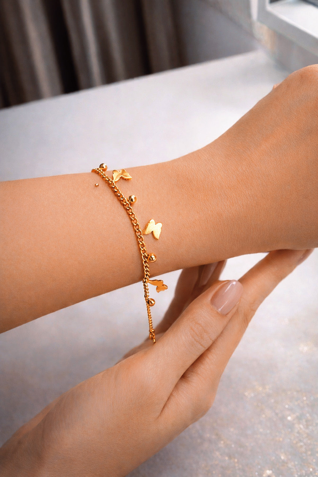 STAINLESS STEEL BUTTERFLY CHAIN BRACELET