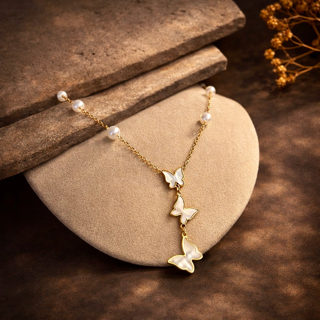 BUTTERFLY PEARL DROP NECKLACE