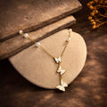 BUTTERFLY PEARL DROP NECKLACE