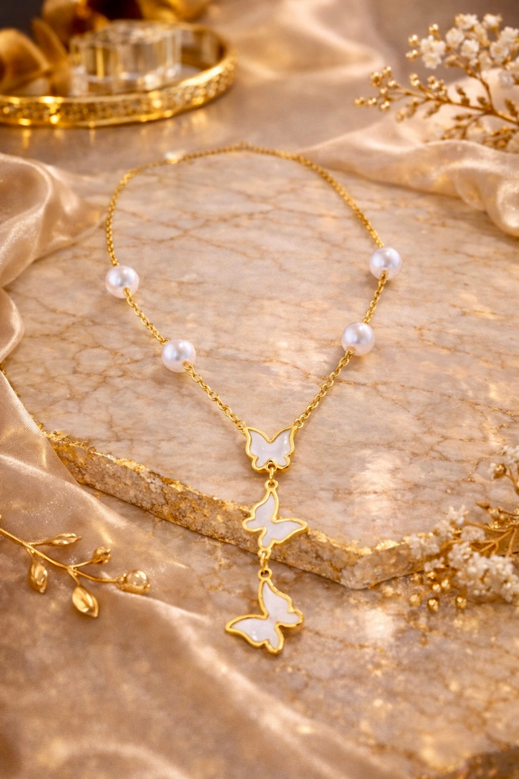 BUTTERFLY PEARL DROP NECKLACE