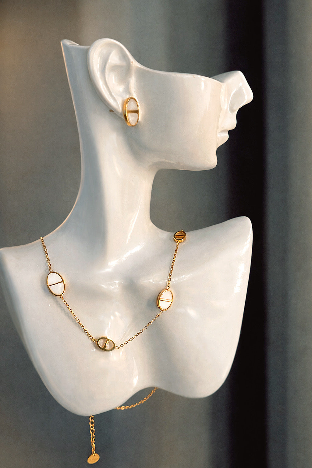 IVORY ORBIT CHARM NECKLACE